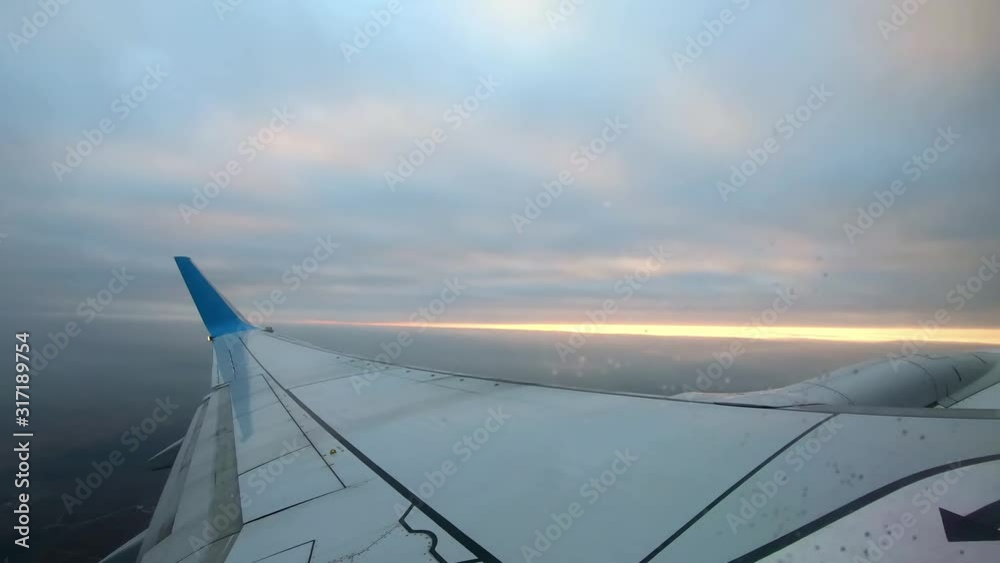Airplane Flying in The Clouds After Take Off. Window View From Inside of the Plane. Airplane Flying in The Clouds After Take Off. Window View From Inside of the Plane.