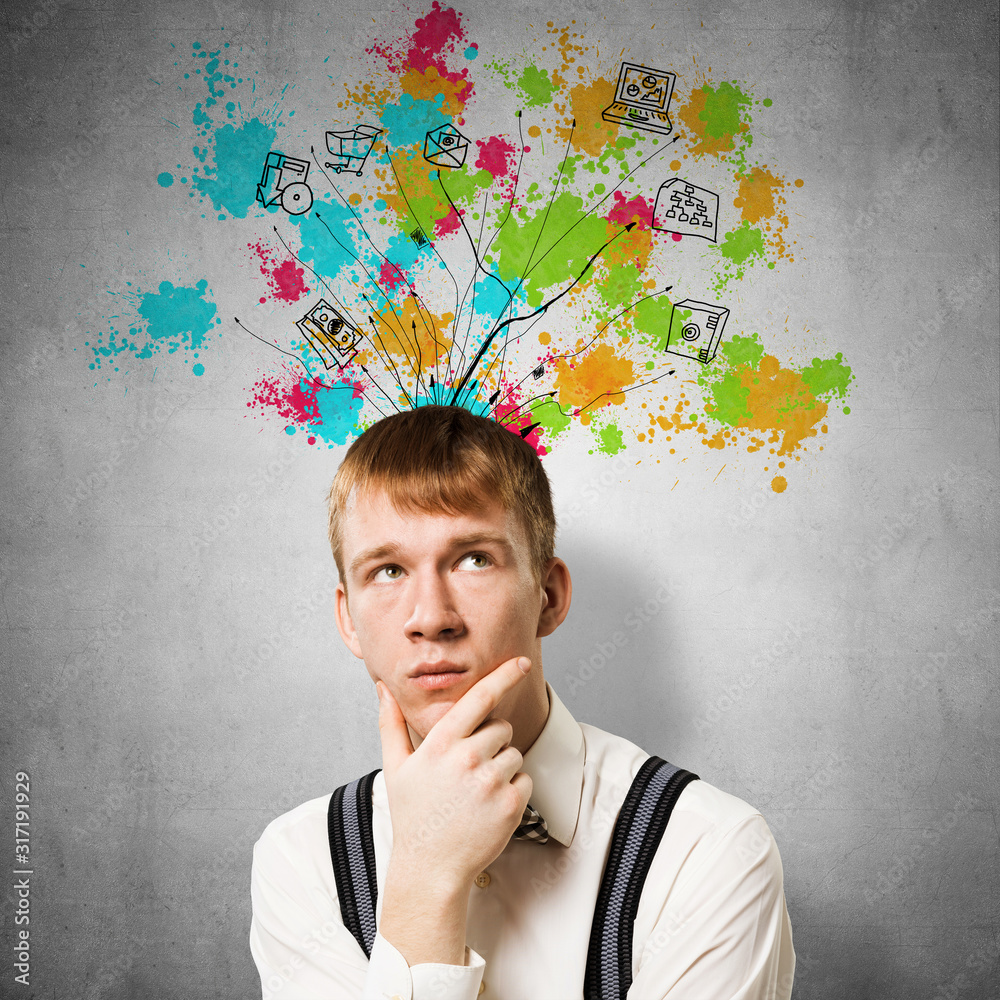 Thoughtful redhead student planning your day Thoughtful redhead student planning your day