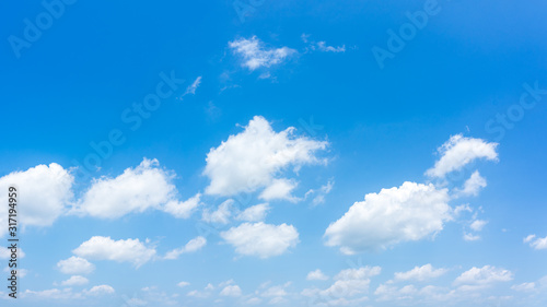 Blue sky and clouds natural background.