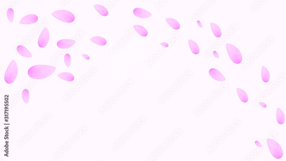 曲線を描きながら流れる桜の花びら