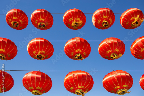 Traditional red lanterns on blue sky. Asia. Chinese New Year festival. Spring Festival.