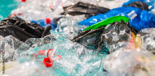 Problem of trash, plastic recycling, pollution and environmental concept - Plastic rubbish pollution in water environment.