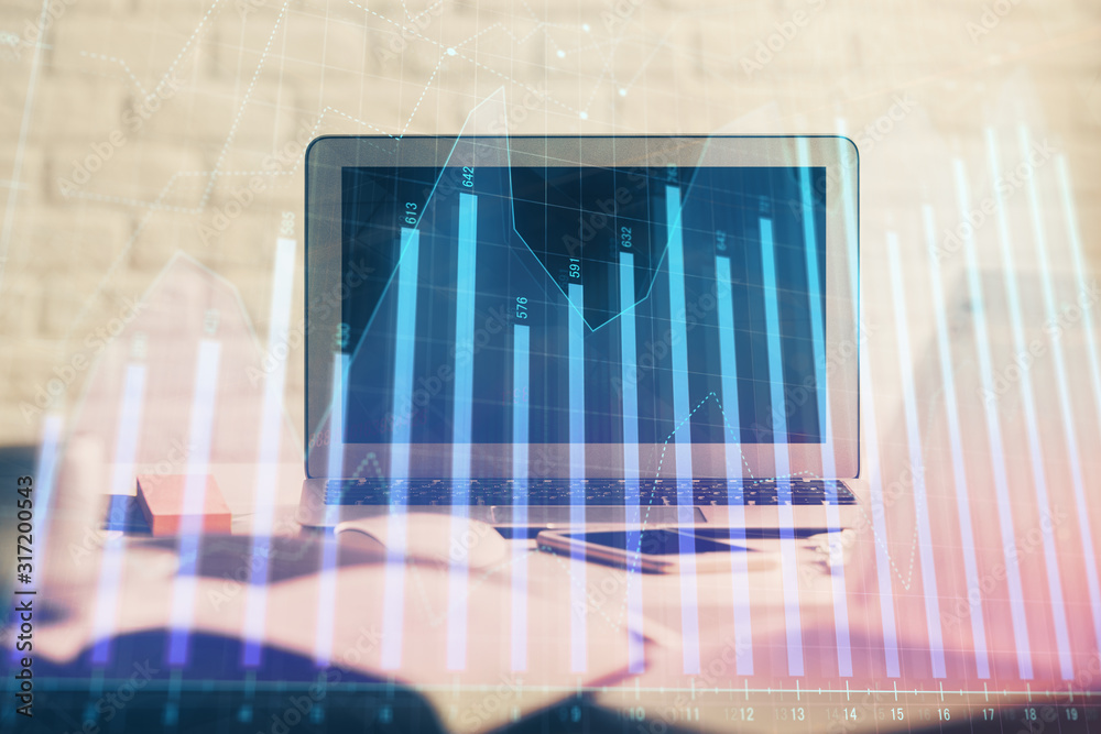 Stock market graph and table with computer background. Double exposure. Concept of financial analysis. Stock market graph and table with computer background. Double exposure. Concept of financial analysis.