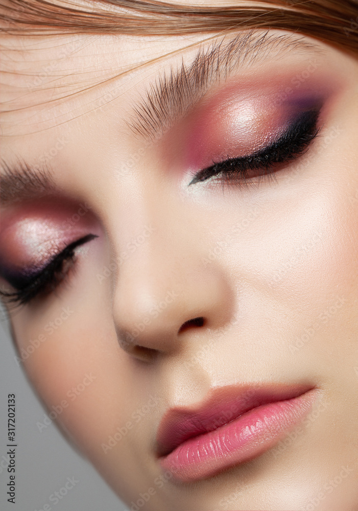 Beautiful woman face close up portrait studio on white. Beautiful woman face close up portrait studio on white.