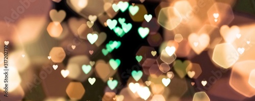 abstract background of  bokeh lights with many hearts - concept love