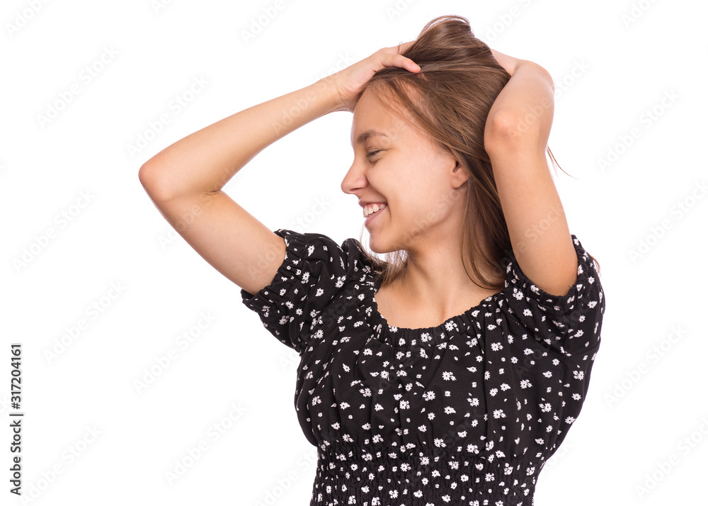 Portrait of caucasian teen girl, isolated on white background. Beautiful young teenager smiling with wind in her hair. Happy cute child laughing. Portrait of caucasian teen girl, isolated on white background. Beautiful young teenager smiling with wind in her hair. Happy cute child laughing.