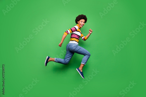 Photos Full size profile side photo of positive cheerful afro american girl jump run af