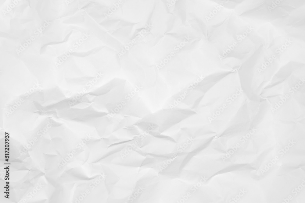 White crumpled paper texture background. Clean white paper. Top view. White crumpled paper texture background. Clean white paper. Top view.