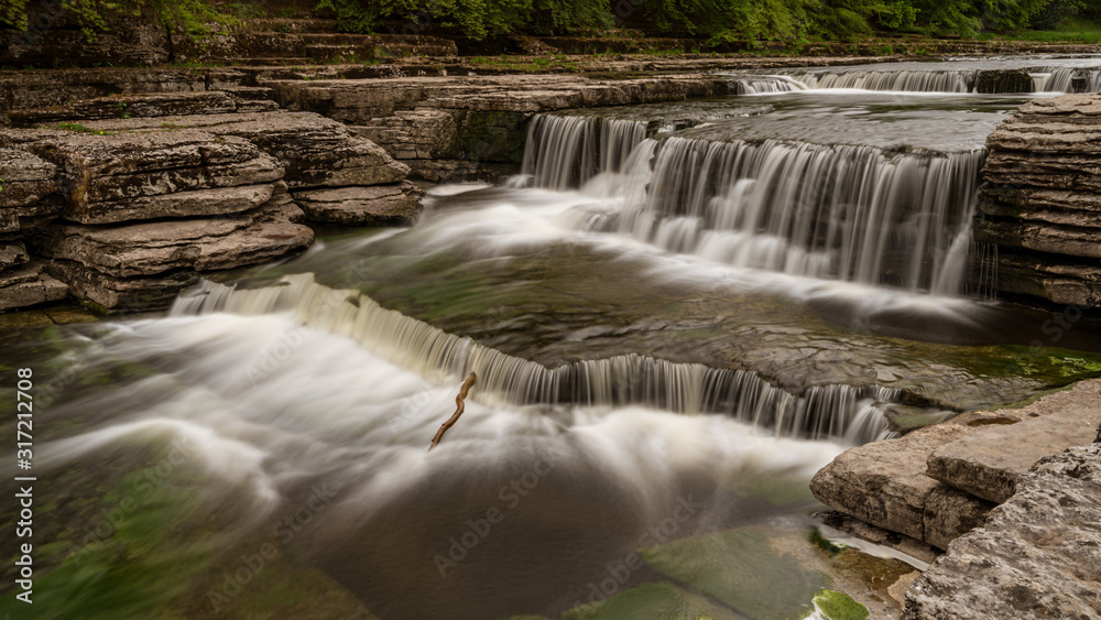 The Lower Falls of the Aysgarth Falls, North Yorkshire, England, UK The Lower Falls of the Aysgarth Falls, North Yorkshire, England, UK