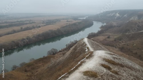 Cretaceous mountains in late autumn. Hiking and flying over the mountains.