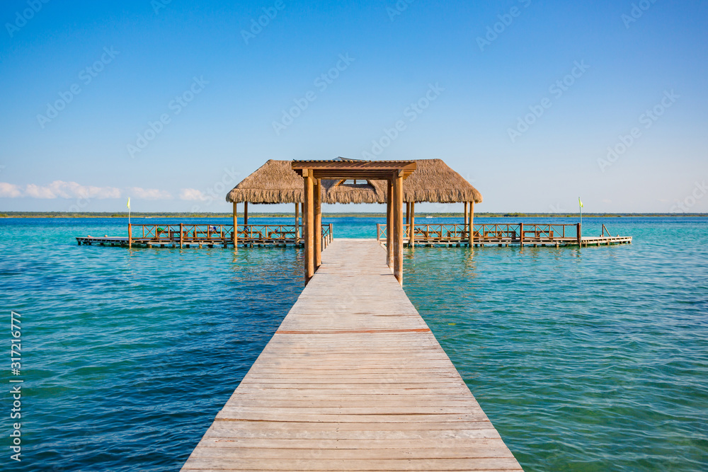 Pier in the sea with clear blue water