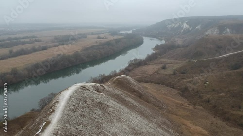 Cretaceous mountains in late autumn. Hiking and flying over the mountains.