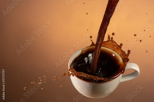 pouring splash coffee cup