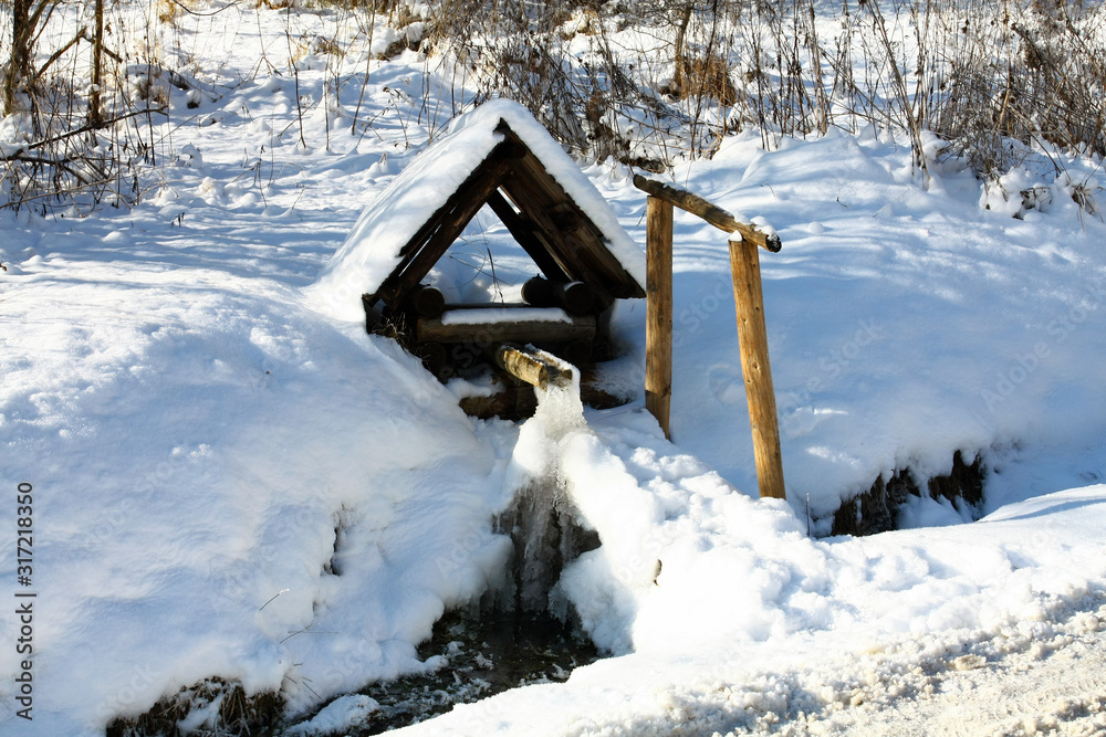 Spring of water in winter Spring of water in winter