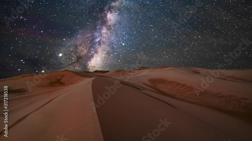 Amazing views of the desert under the night starry sky. Timelapse photo