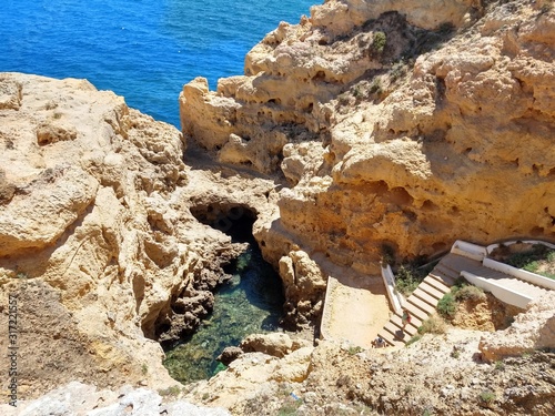  rocky coast beaches with crystal clear water photo