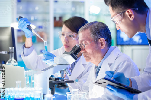asian scientist team meeting
