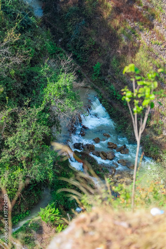 A river flowing through gorge in the hills of Nepal.