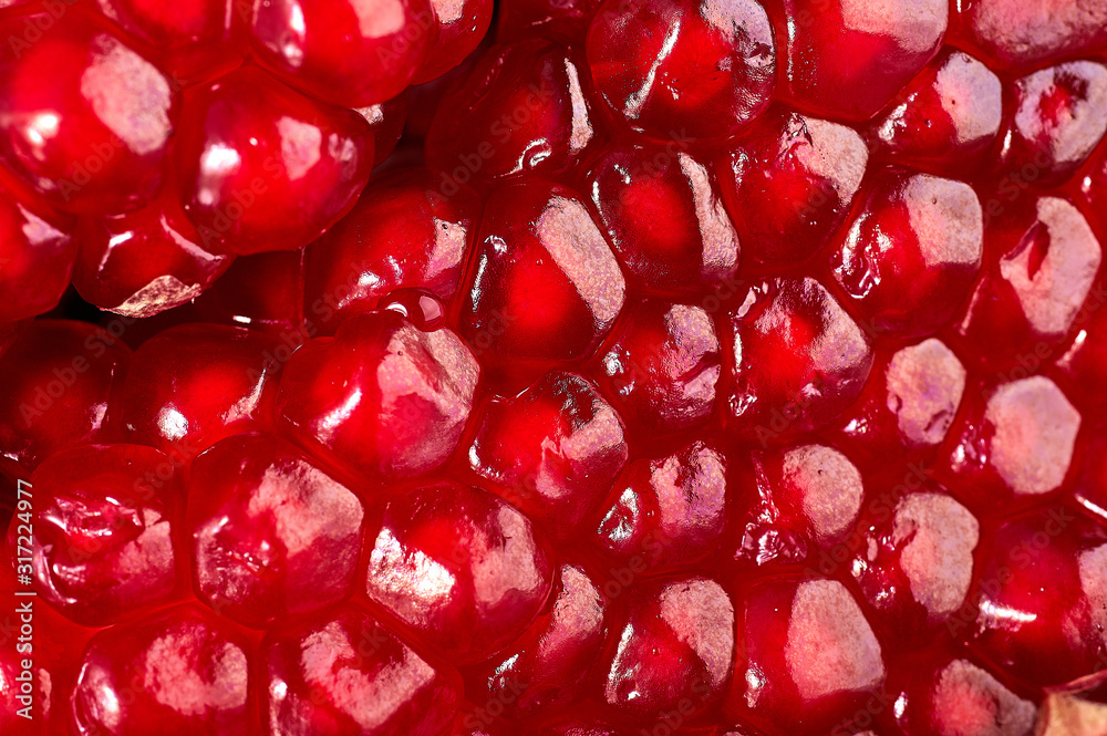 Pomegranate fruit. Pomegranates over black Background. Organic Bio fruits Pomegranate fruit. Pomegranates over black Background. Organic Bio fruits