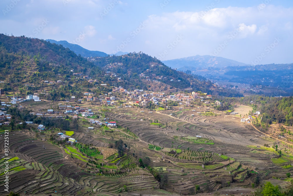 Fototapeta premium Terrace rice farm barren after harvest season in Nepal.