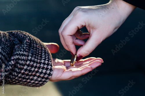 Photos Giving money to someone on the streets