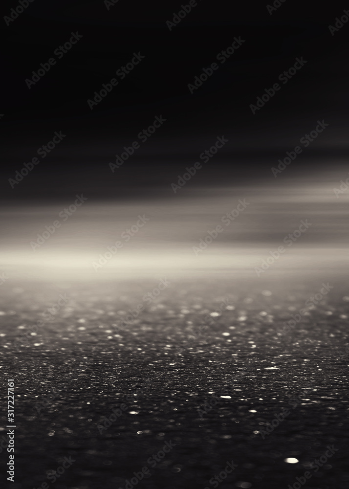 Dramatic black and white background. Cloudy night sky, moonlight, reflection on the pavement. Smoke and fog on a dark street at night. Dramatic black and white background. Cloudy night sky, moonlight, reflection on the pavement. Smoke and fog on a dark street at night.