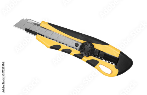 Yellow and black construction knife isolated photo