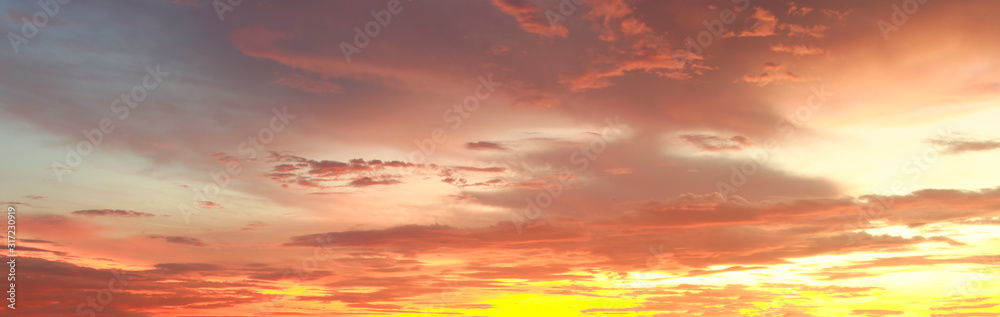 Beautiful sunset sky and clouds with dramatic light, Twilight sky background,Orange and red sky and light of the sun-Image