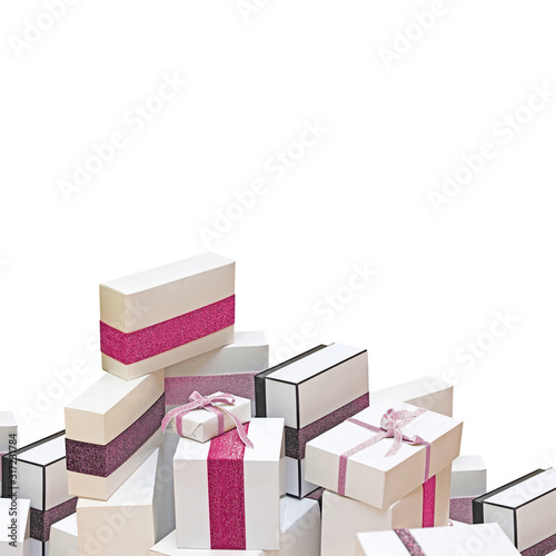 Festively decorated boxes. Pile of gifts isolated on a white background. Gift concept, pink tone, copy space