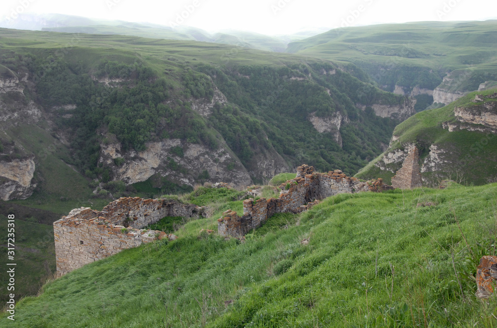 Ruins of medieval fortress. Outskirts of Makazhoy village, Chechnya (Chechen Republic), Russia, Caucasus.