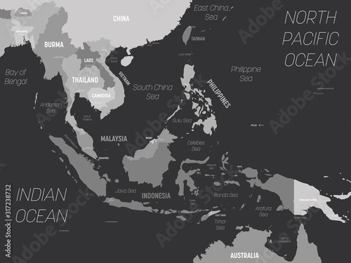 Southeast Asia map - grey colored on dark background. High detailed political map of southeastern region with country, capital, ocean and sea names labeling