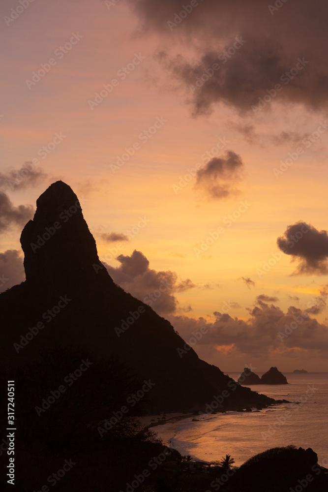 Sunset over the sea and mountains