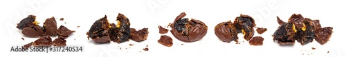 chocolate candy with prunes on white background