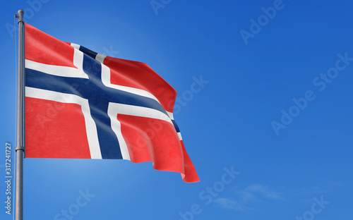 Bouvet Islands flag waving in the wind against deep blue sky. National theme, international concept. Copy space for text. photo