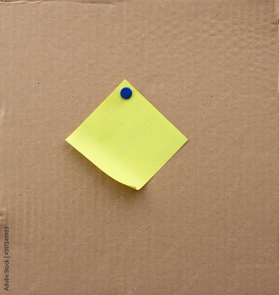 blank square sheet of paper attached with an iron button blank square sheet of paper attached with an iron button