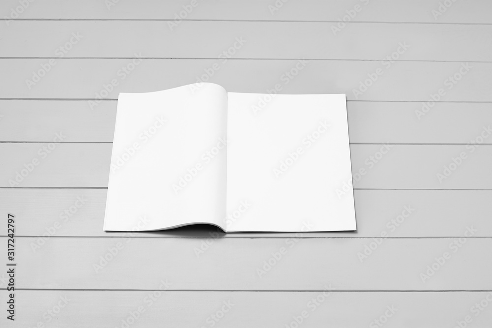 Mock-up magazine, newspaper or catalog on gray background. Blank page Mock-up magazine, newspaper or catalog on gray background. Blank page