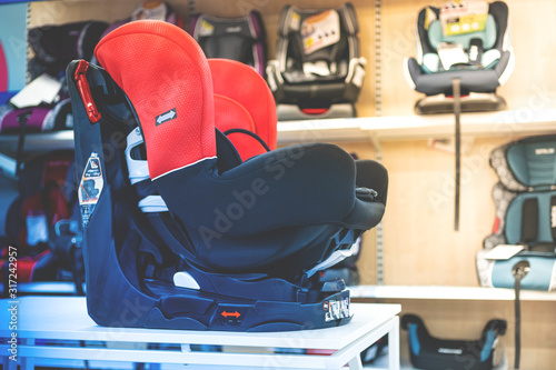 children's car seat in the store. safety of children in the car