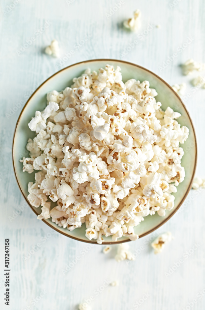 Bowl of fresh prepared popcorn. Top view. Copy space Bowl of fresh prepared popcorn. Top view. Copy space