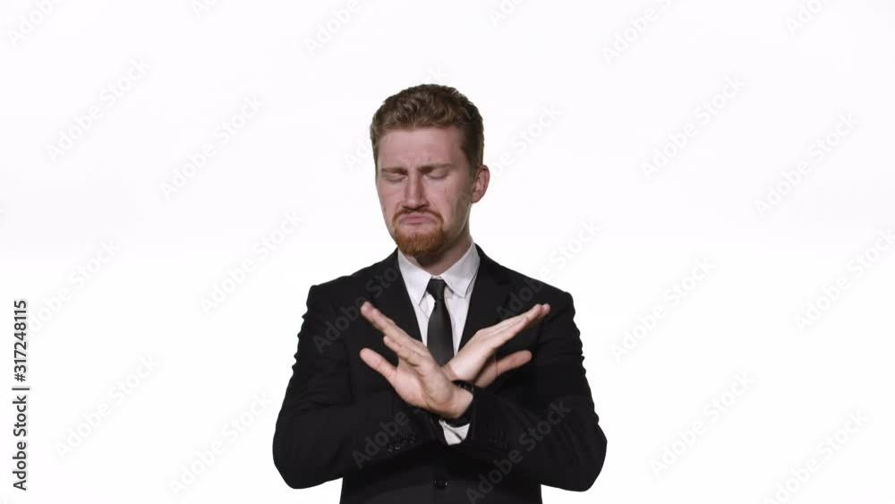Businessman refuses and disapproves waves his hands Businessman refuses and disapproves waves his hands