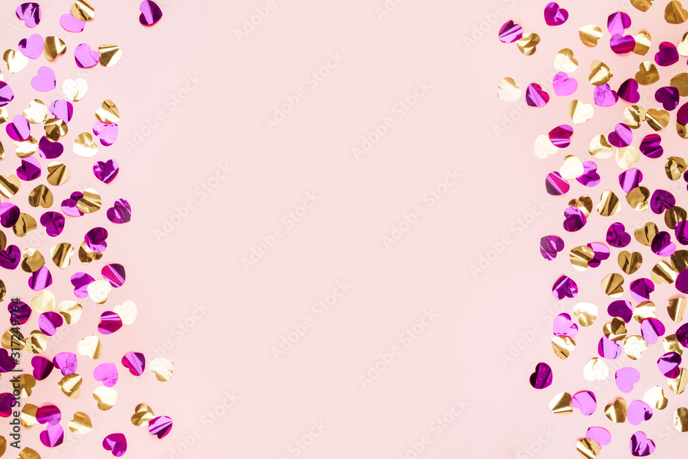 Colorful heart confetti on a background.