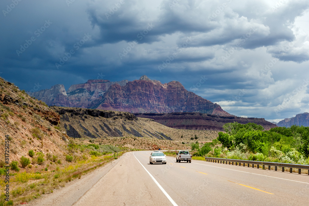 Gathering thunderstorm over Grand Staircase Escalante national monument that surrounds scenic route 389 in Utah, USA