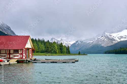 The picturesque mountain Maligne Lake in the Jasper National Park. Boat house on the lake. Canadian Rockies