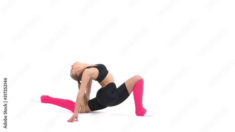 Close-up demonstration video of a young professional sportswoman doing gymnastic exercises, stretching her body Close-up demonstration video of a young professional sportswoman doing gymnastic exercises, stretching her body