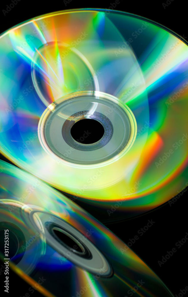 compact-discs on a black background compact-discs on a black background