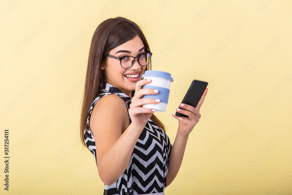 Coffee lover concept. Closeup photo portrait of delightful cheerful positive with toothy beaming smile person holding cup of warm latte in hands cuddling to herself isolated bright color background Coffee lover concept. Closeup photo portrait of delightful cheerful positive with toothy beaming smile person holding cup of warm latte in hands cuddling to herself isolated bright color background