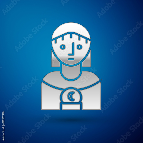 Silver Astrology woman icon isolated on blue background. Vector Illustration