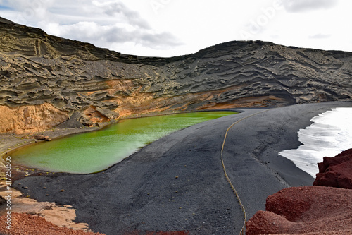 El Golfo green lagoon in Lanzarote, Canary Islands photo