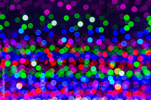 Blurry colorful of LED light on night. © Petch A Ratana
