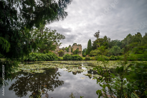 castle ruin England with a pond and trees