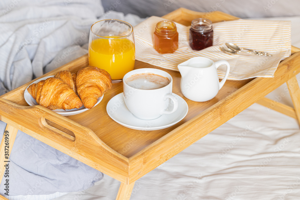 Breakfast on the bed. Good morning concept.